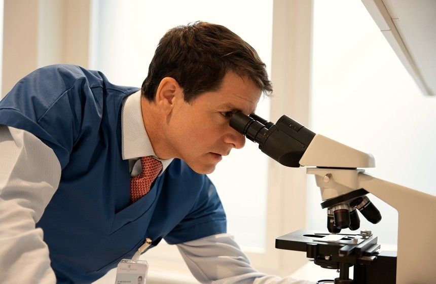Dr Julen at the microscope